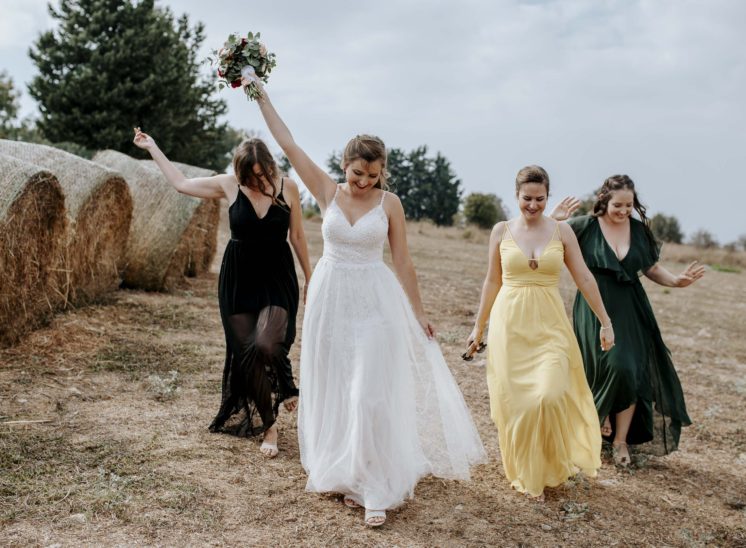 bride and brides mates in the field